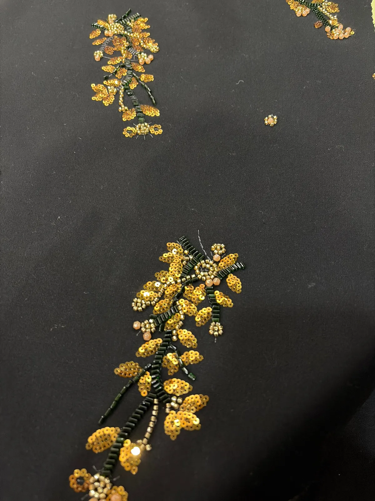 绍兴市星承纺织品有限公司 珠子+亮片 P:100%